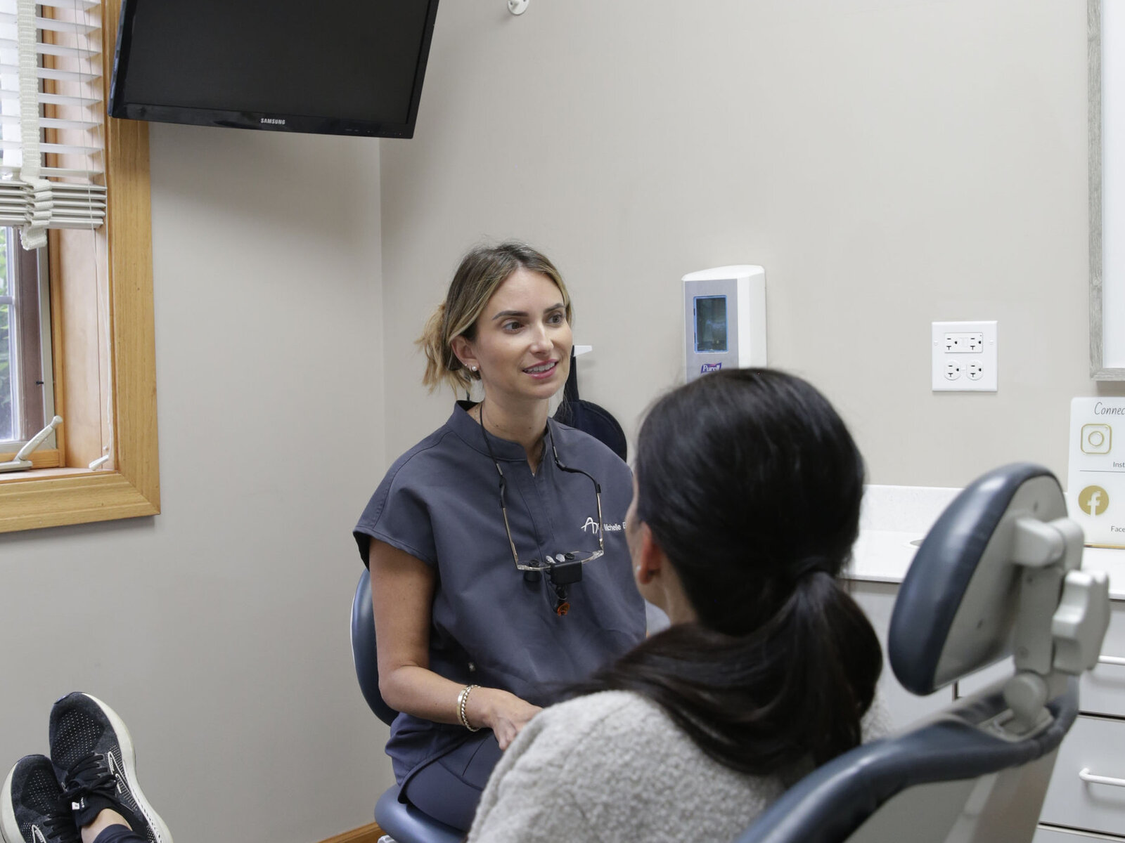 Dr. Barrera caring for a patient in our Orland Park treatment room